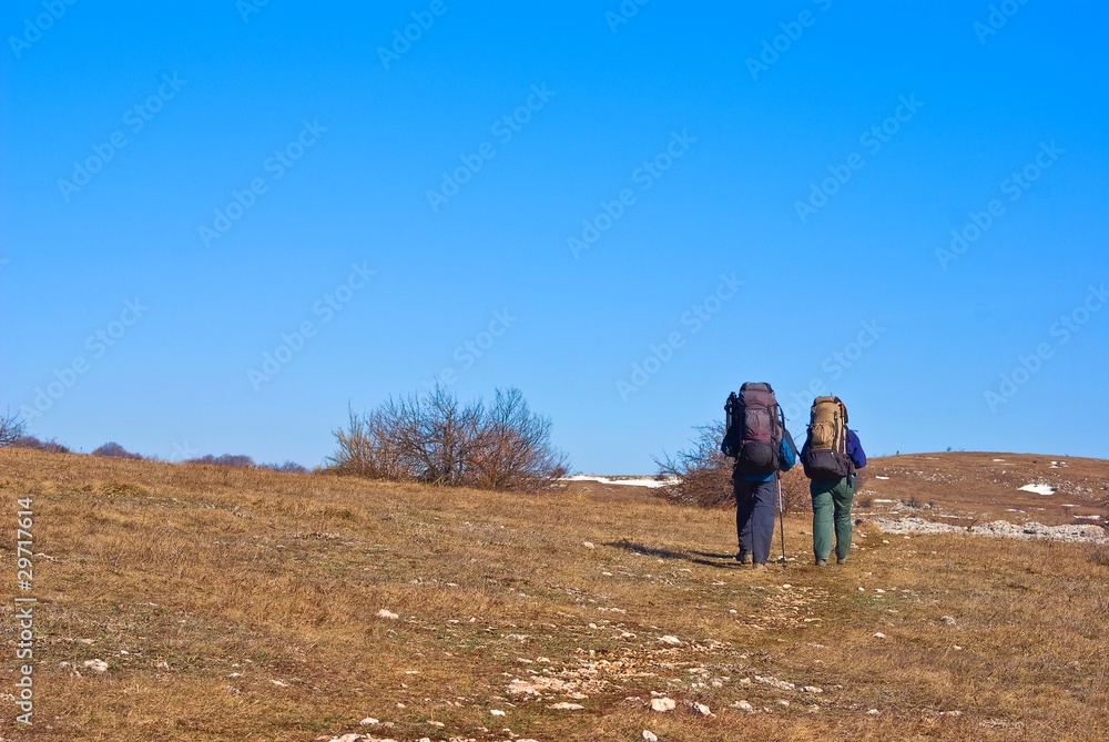 tourists walking in a steppe