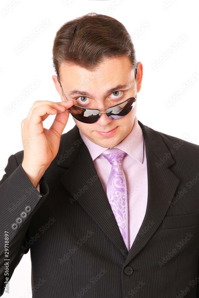 Businessman with glasses looks askance Businessman with glasses looks askance