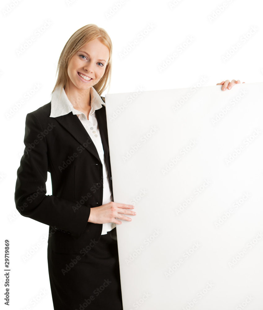 Cheerful businesswomen presenting empty board Cheerful businesswomen presenting empty board