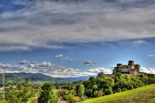 Torrechiara Castle with blue sky photo