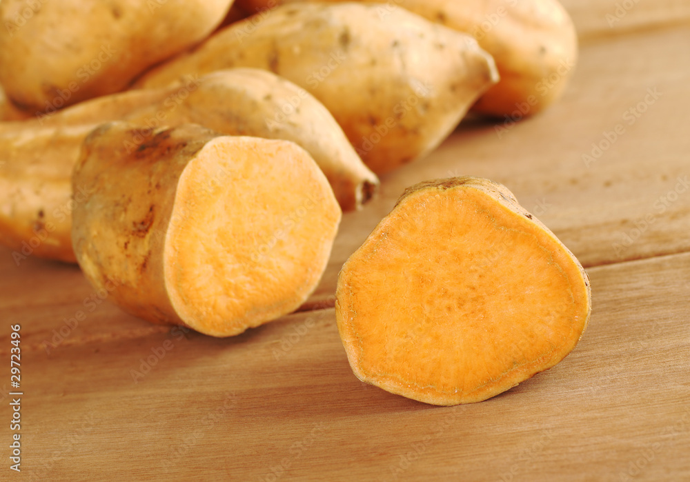 Sweet potatoes halves (lat. Ipomoea batatas) Sweet potatoes halves (lat. Ipomoea batatas)
