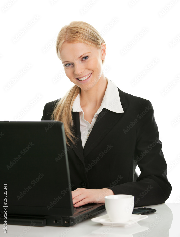 Beautiful business woman working on laptop Beautiful business woman working on laptop