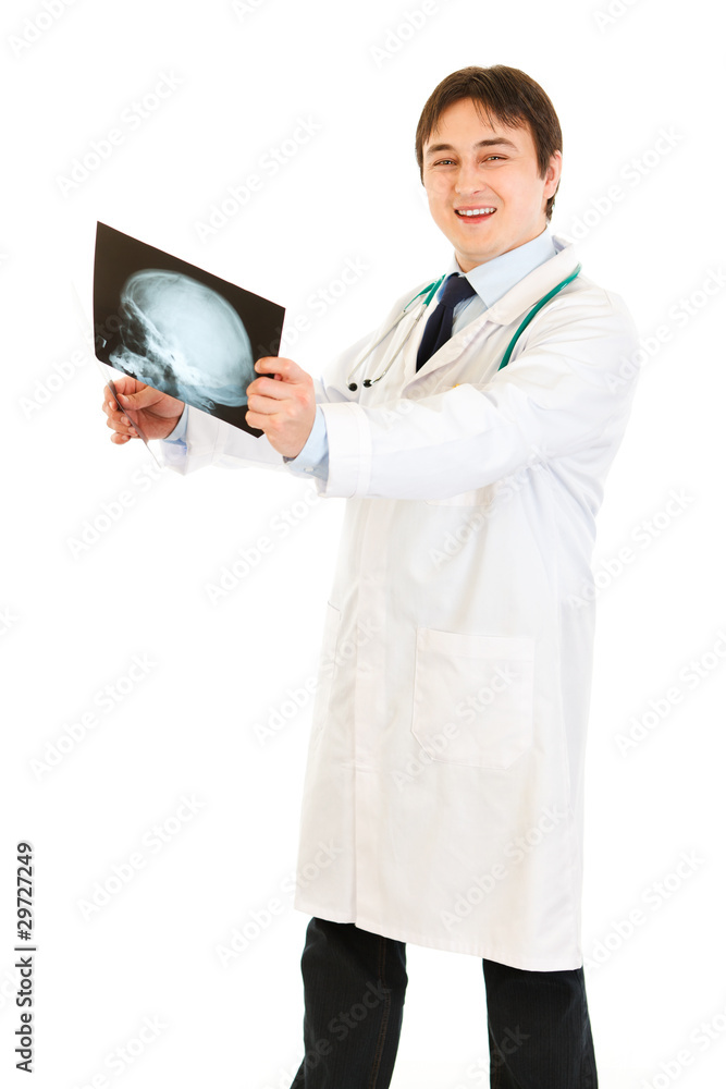 Smiling medical doctor pleased with results of heads roentgen Smiling medical doctor pleased with results of heads roentgen