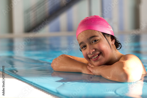 little girl in pool. blue water © Smailhodzic