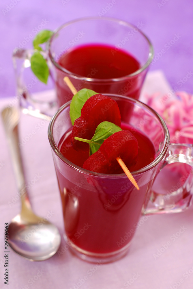 clear beet soup in glass