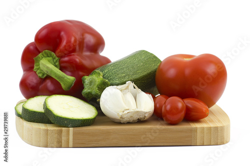 fresh vegetables on a wooden cutting board