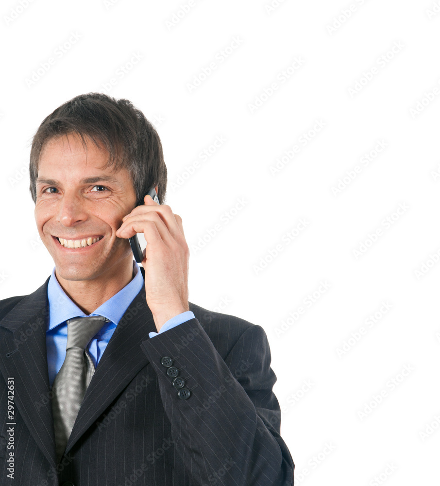 Mature businessman talking on the phone isolated on white Mature businessman talking on the phone isolated on white