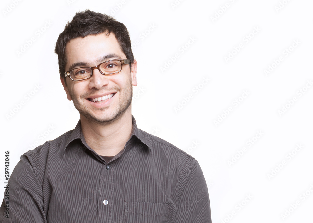 Young man with glasses smiling Young man with glasses smiling