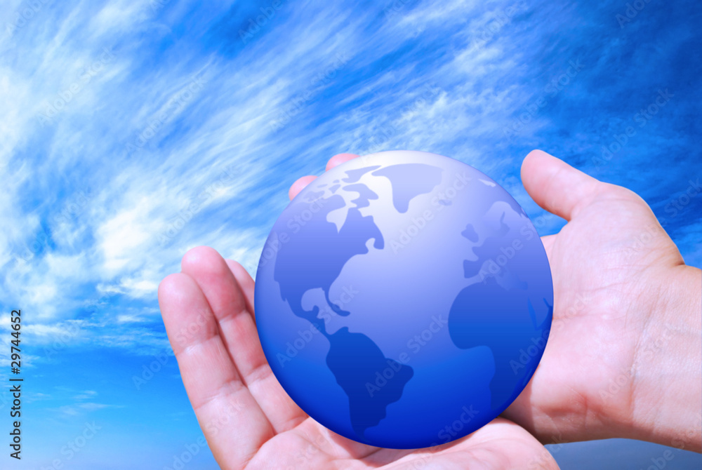 Earth in female hands on a background of the blue sky Earth in female hands on a background of the blue sky