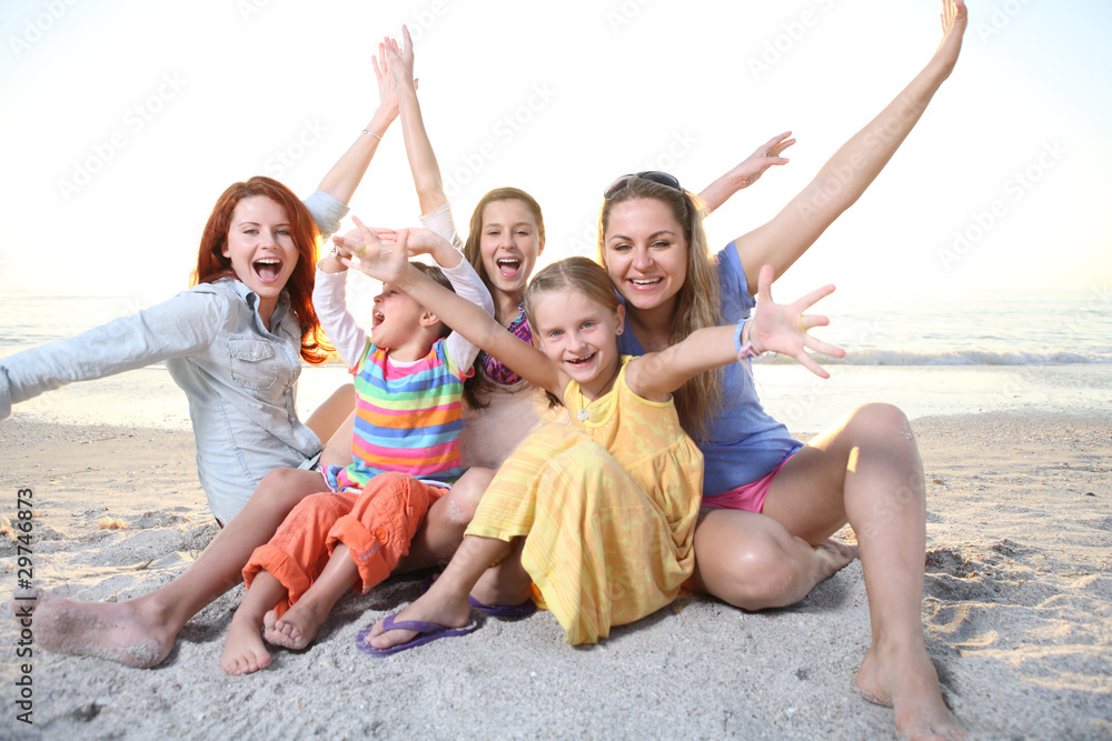 Family playing at the sunny beach. Family playing at the sunny beach.