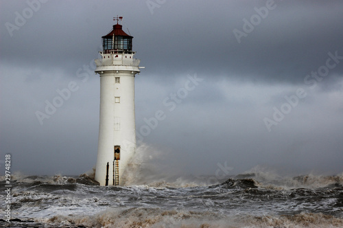 Waves slap against New Brighton lighthouse on the river mersey #29748218