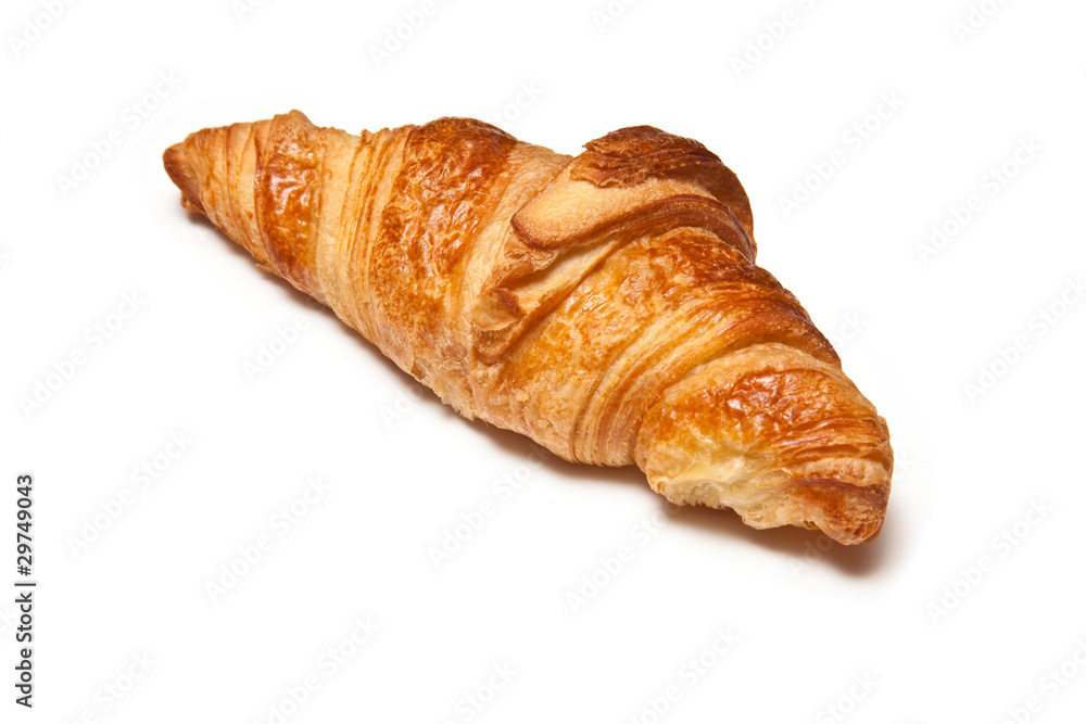 Butter Croissant isolated on a white studio background. Butter Croissant isolated on a white studio background.