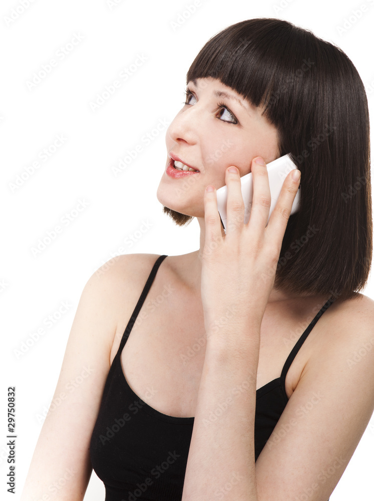 Woman talking on her mobile phone Woman talking on her mobile phone