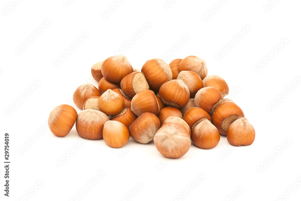 Composition from nuts on the white isolated background Composition from nuts on the white isolated background