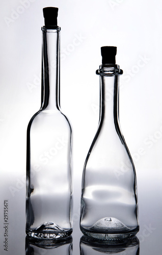 Two empty corked bottles
