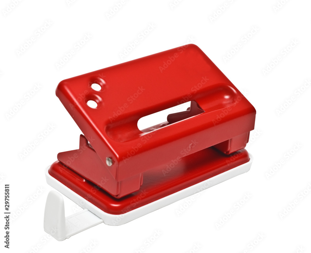 Red office hole punch on a white background Red office hole punch on a white background