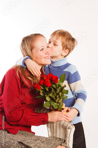 woman with a son and with the bouquet of red roses