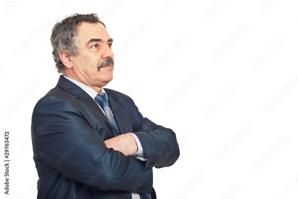 Mature business man looking away