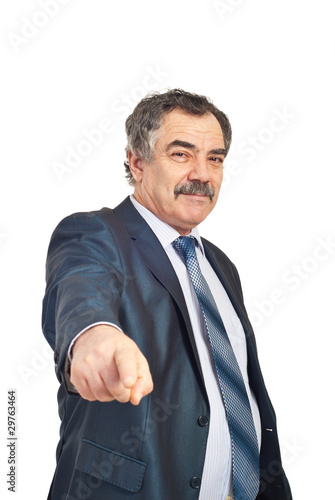 Mature businessman pointing to you