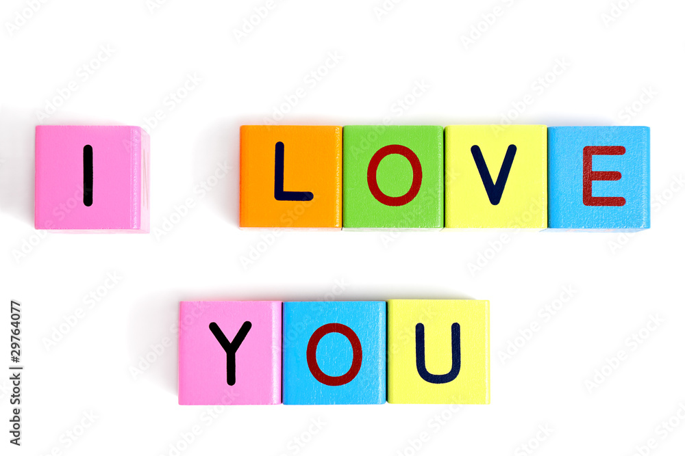 Phrase I LOVE YOU formed from wooden letter blocks Phrase I LOVE YOU formed from wooden letter blocks