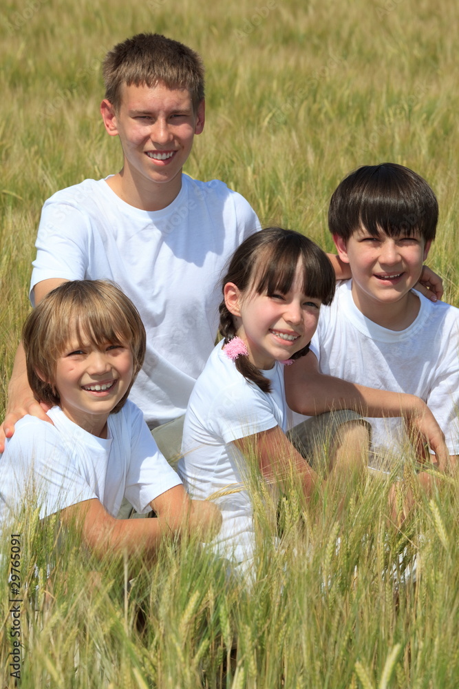 Fototapeta premium Happy children in corn field