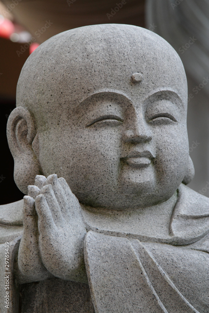 A statue of a Buddhist monk A statue of a Buddhist monk