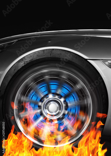 Car wheel and flames © INFINITY