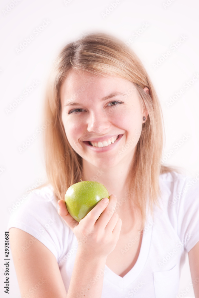 Beautiful woman eating an apple Beautiful woman eating an apple