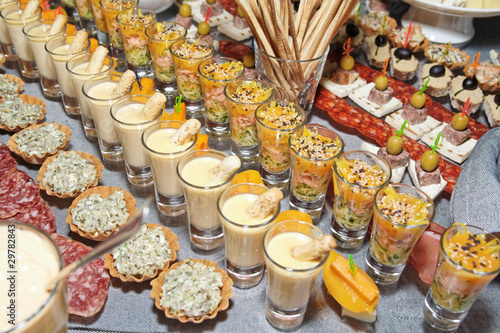 Snacks and sweets on banquet table