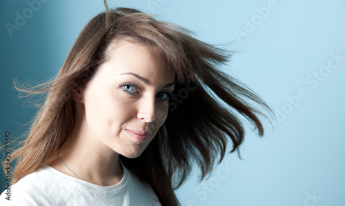 Pretty brunette wind portrait photo