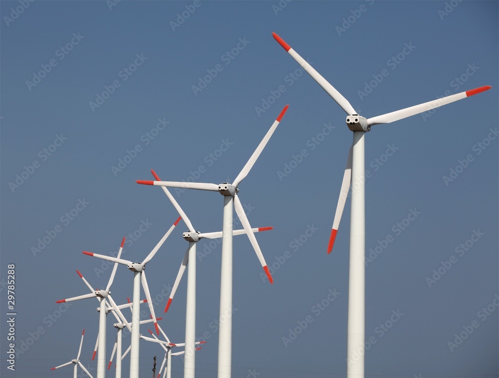 Farm of wind turbines; telephoto shot Farm of wind turbines; telephoto shot