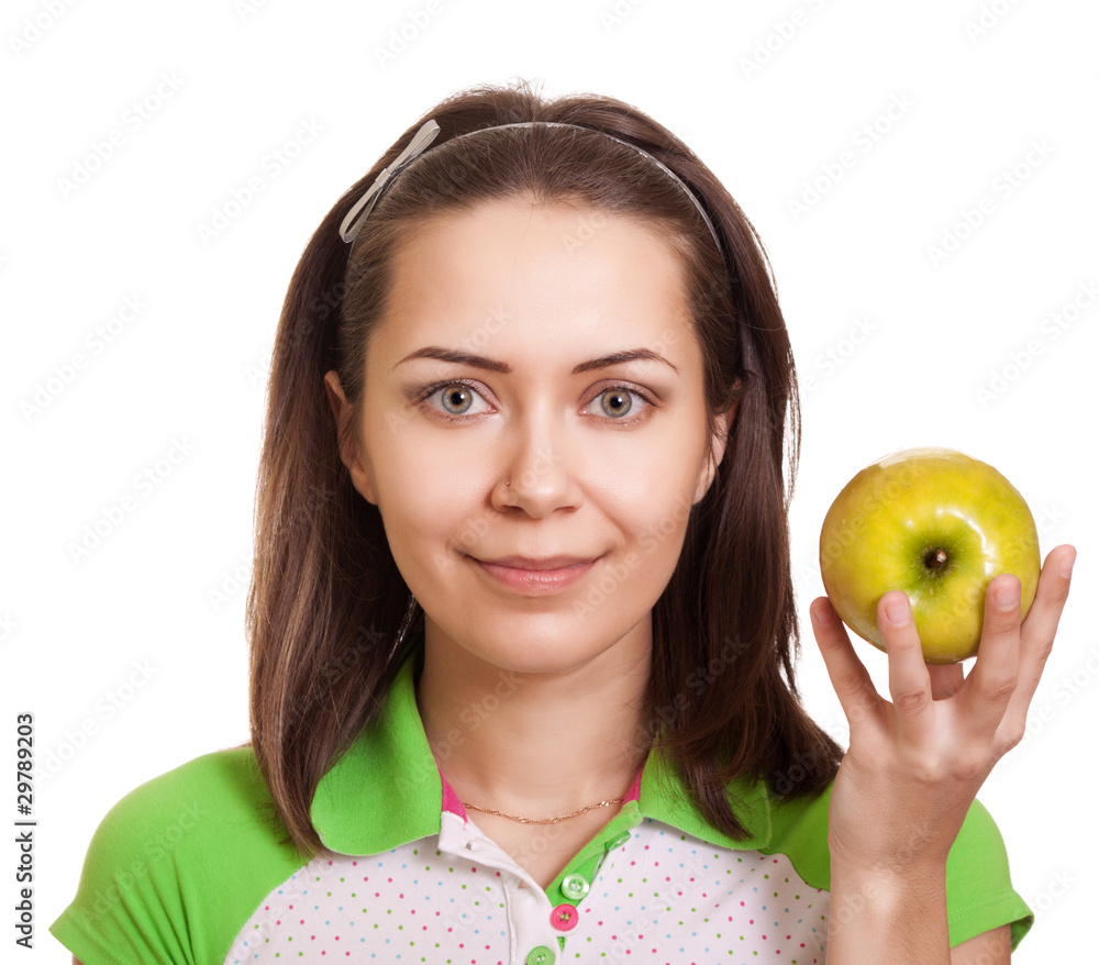 Young happy woman with green apple isolated on white Young happy woman with green apple isolated on white