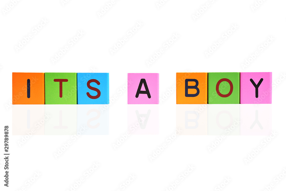 phrase ITS A BOY formed with wooden letter blocks phrase ITS A BOY formed with wooden letter blocks