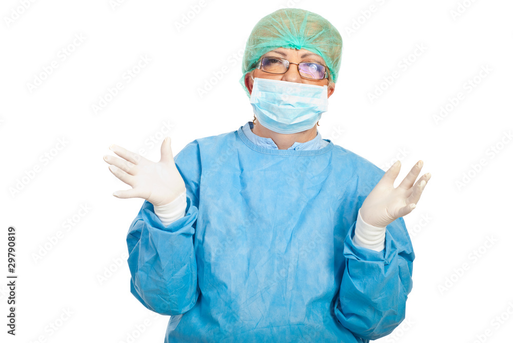 Surgeon woman showing hands in latex gloves Surgeon woman showing hands in latex gloves