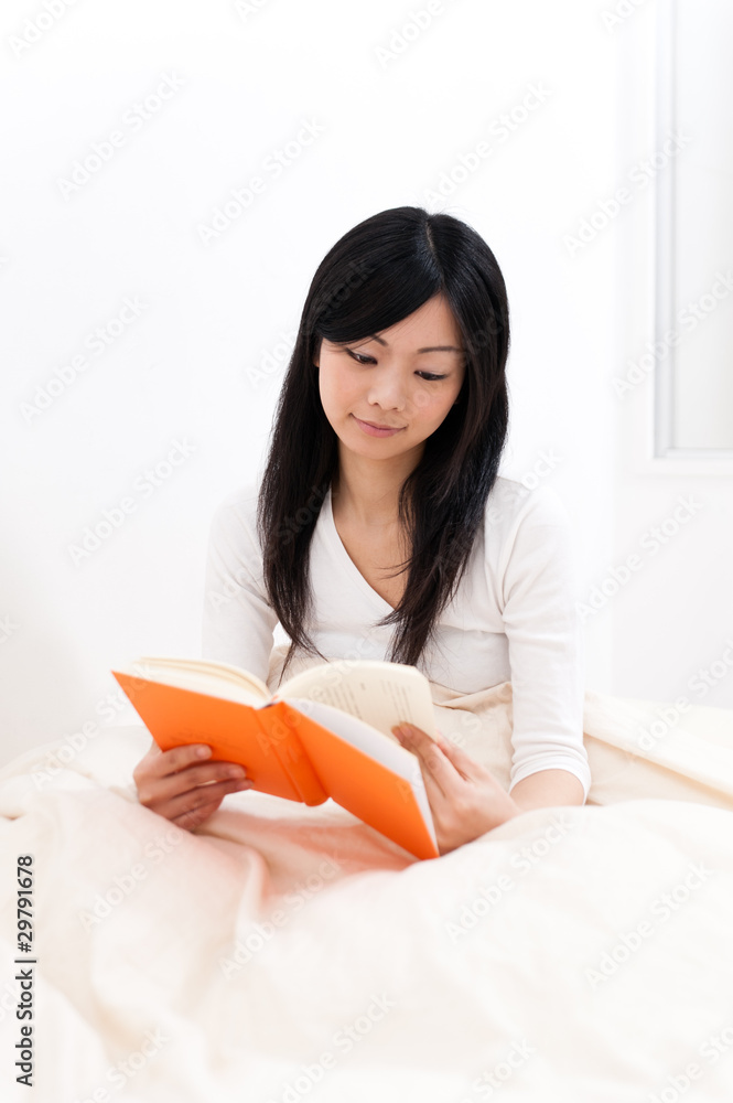 a portrait of beautiful asian woman reading a book a portrait of beautiful asian woman reading a book