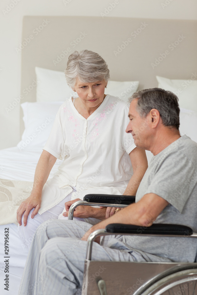 Mature couple in their bedroom Mature couple in their bedroom