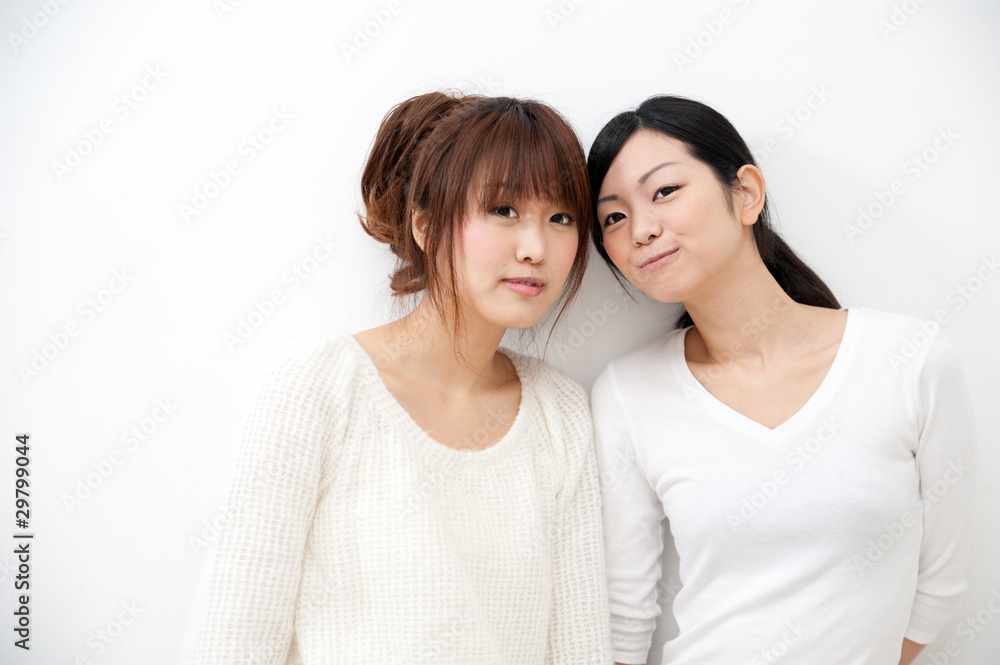 two beautiful asian women relaxing two beautiful asian women relaxing
