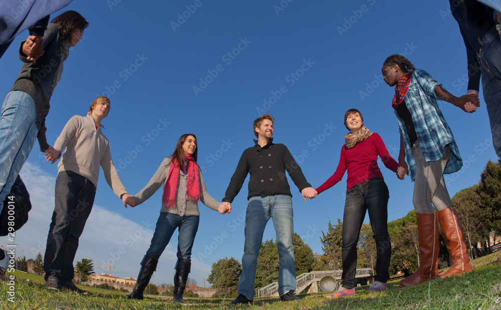 Εκτύπωση καμβά Multiracial Young People Holding Hands in a Circle