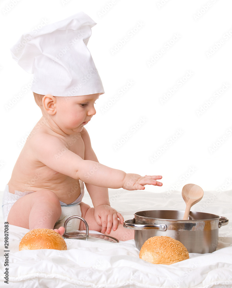 Baby, spoon, pot and bread isolated on white background Baby, spoon, pot and bread isolated on white background