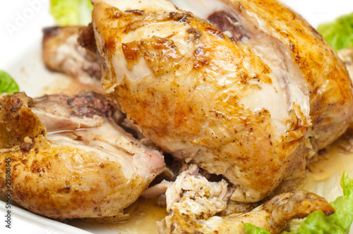 closeup shot of a baked chicken © rauf_ashrafov