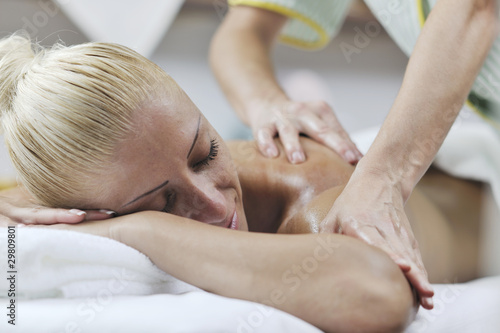 woman back massage treatment