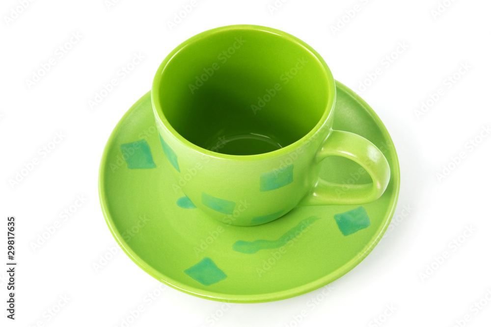 empty green cup with plate on white background empty green cup with plate on white background