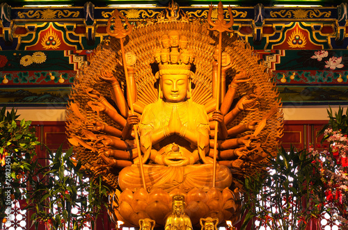 Golden Wood Statue of Guan Yin with 1000 hands photo