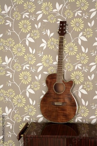 acoustic guitar retro on vintage 60s wallpaper