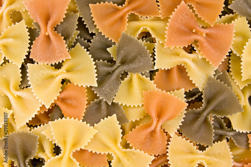 close up of uncooked multi-colored Italian macaroni