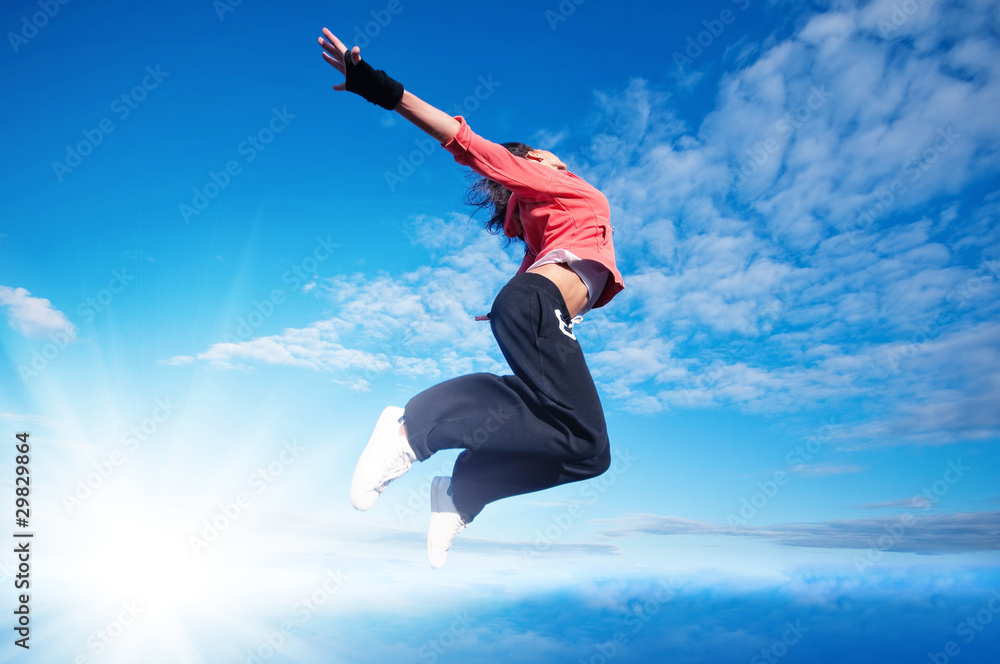 sport woman jumping and fly over sky and sun sport woman jumping and fly over sky and sun