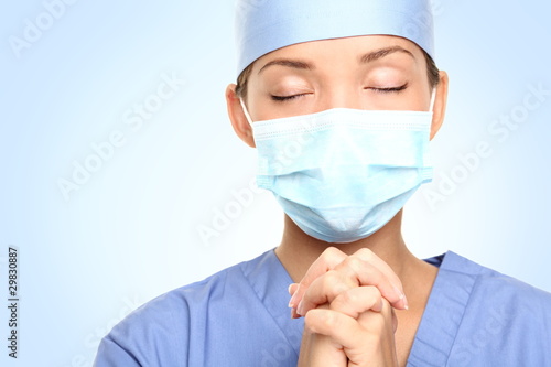 Canvas Print medical doctor praying