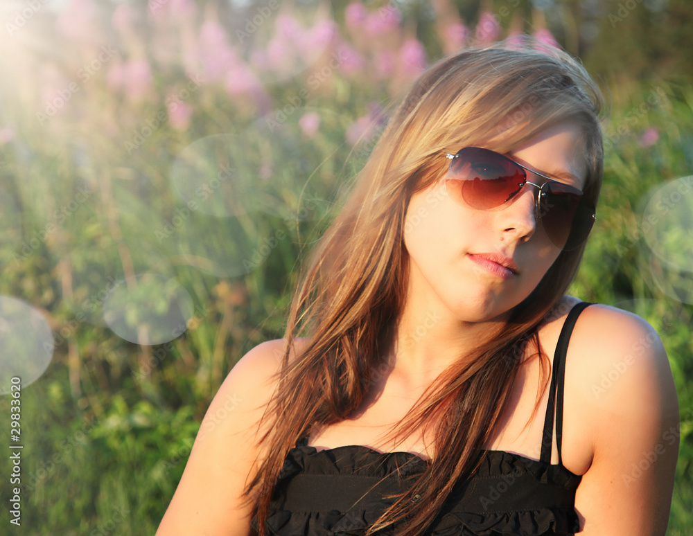 Portrait of a beautiful woman in grass Portrait of a beautiful woman in grass