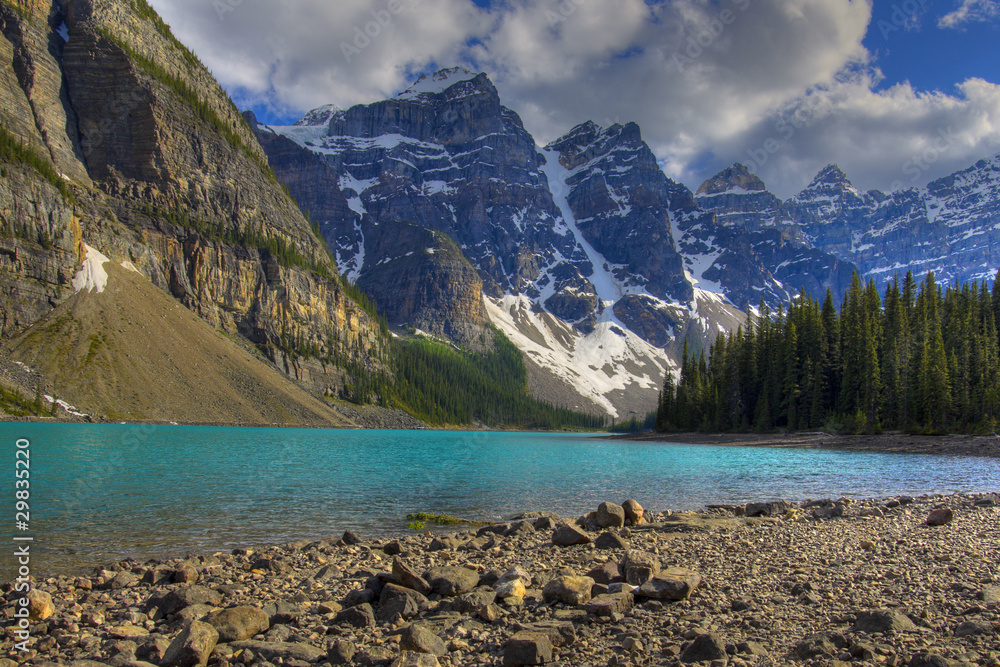 HDR Rocky mountain peaks and moraine lake