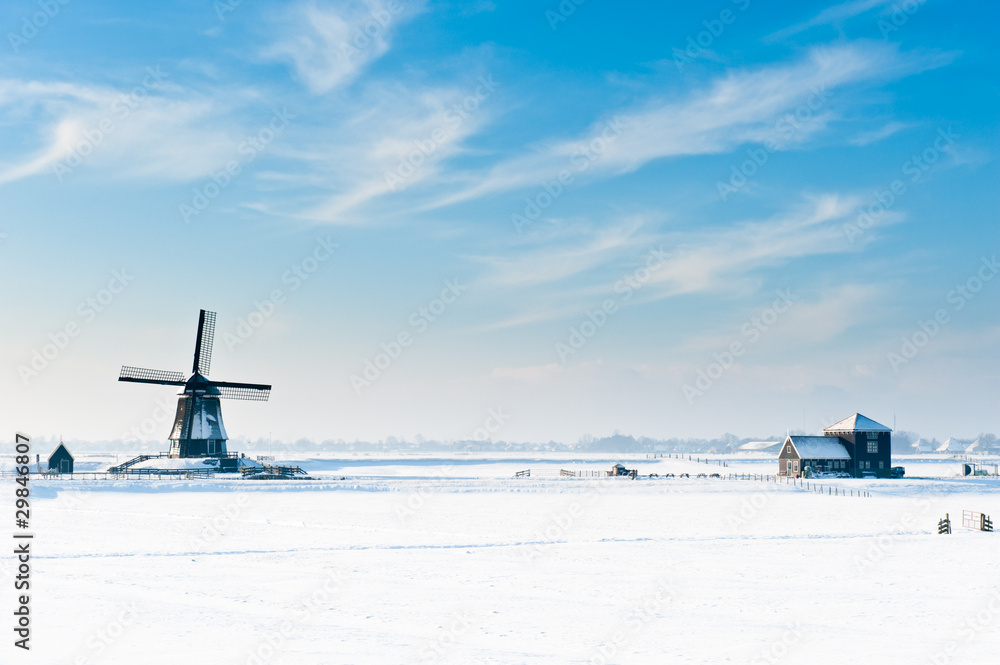 Obraz premium Beautiful winter windmill landscape